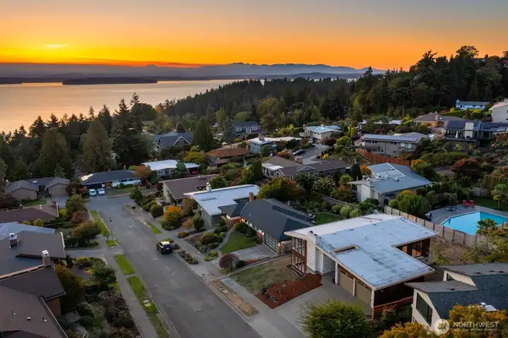 A deluxe mid-century modern home on a premiere street in Fauntlee Hills, West Seattle.  Don't miss out on this
