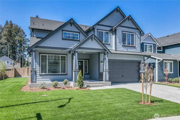 **This home is under construction** Photos are of same plan in the community. Colors and features will vary.