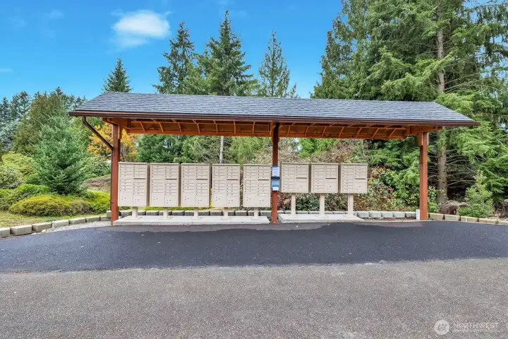 Covered Mailbox kiosk. Take a walk from your home, check for mail and then keep walking on the flat, private streets. No traffic or chaos to spook Fido or you.