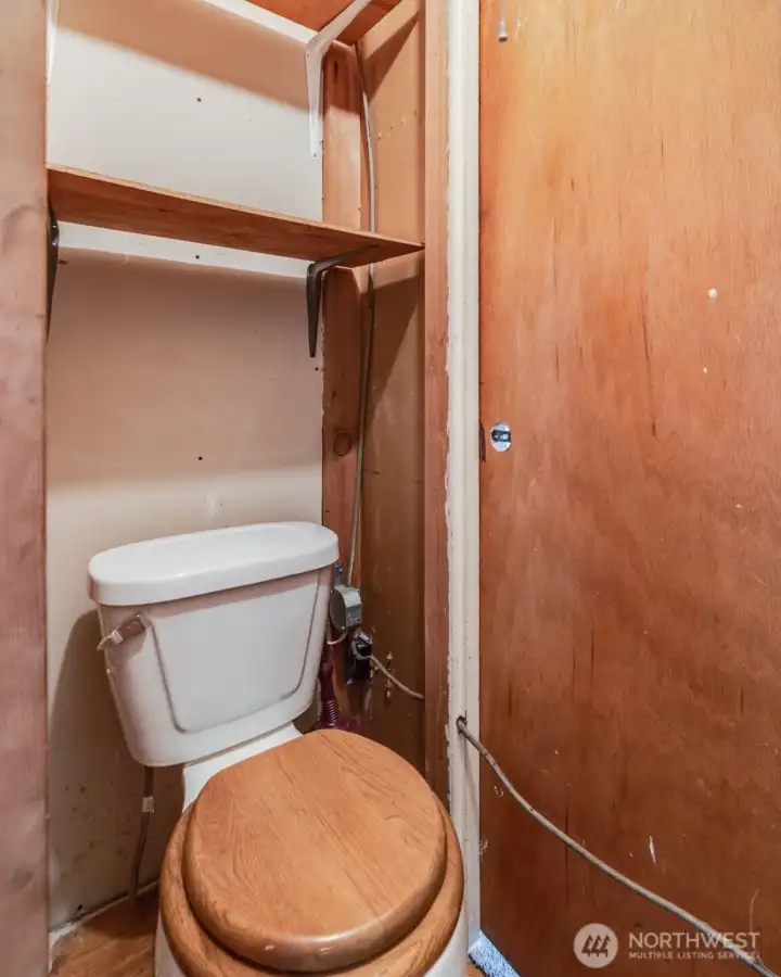 A second toilet has been installed in the second bedroom closet.