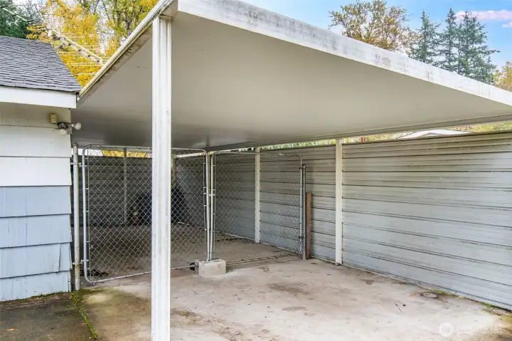 Find two-car tandem covered parking in this well-built carport.