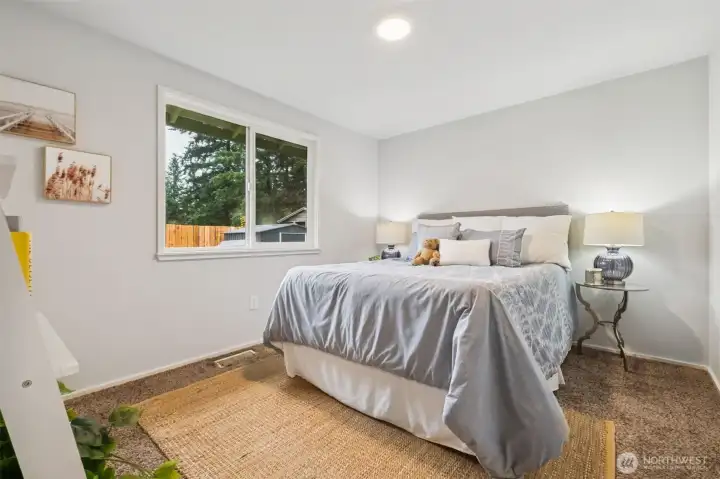 Another well-sized bedroom offering flexibility for your lifestyle—sleep, work, or play. Fresh updates give it a welcoming feel.