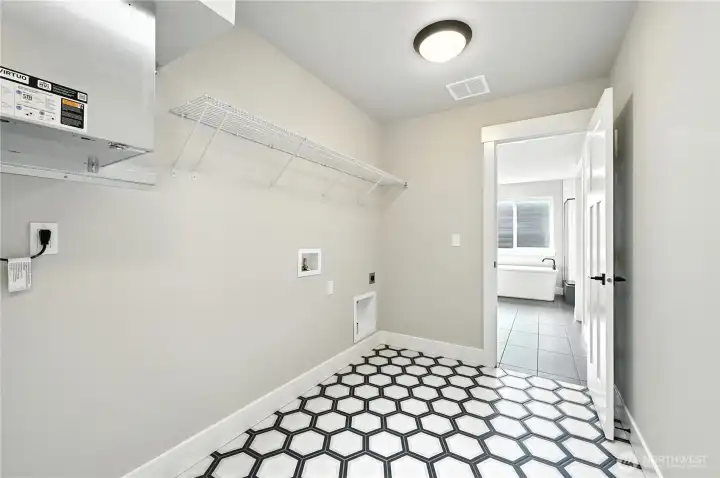 Convenient Upstairs Laundry Room connects to Primary Bathroom