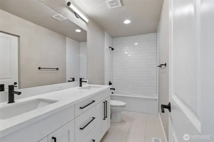 Photos are of a home in a different community and are for illustration purposes only to reflect typical finishes.  May depict seller enhancements.  Colors and options may vary.