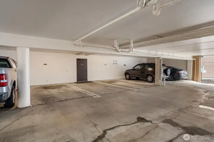 Dedicated garage space #403 and ample guest parking.