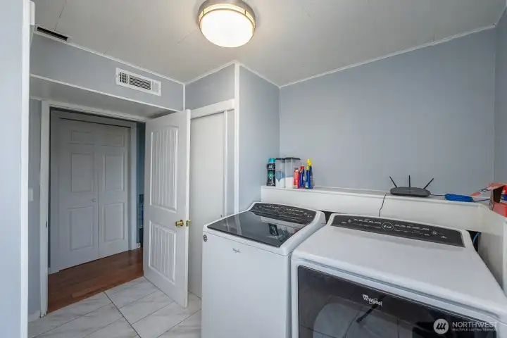 Laundry Room located downstairs- There are Laundry Hookups located in Upstairs garage if you don't want to go up and down stairs so much!