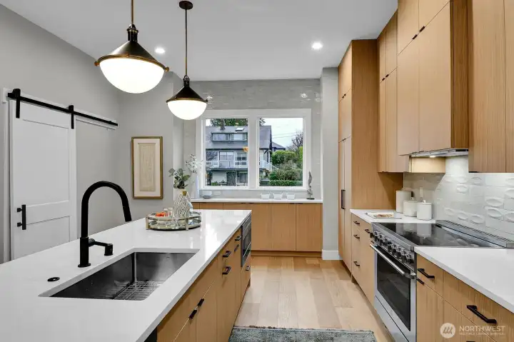Extensive countertops and cabinets.