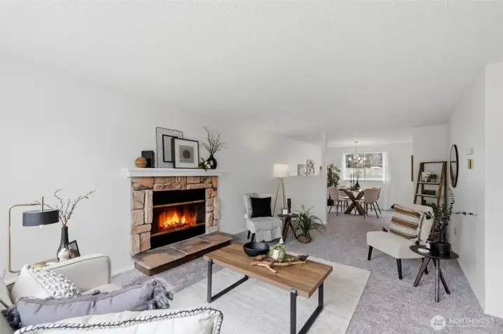 Open concept living and dining area with seamless flow, ideal for gatherings, everyday living, and entertaining.