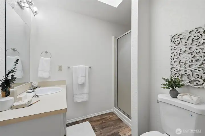 The primary room features a private bathroom.