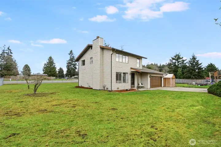 Spacious yard with room to grow, play, and entertain.