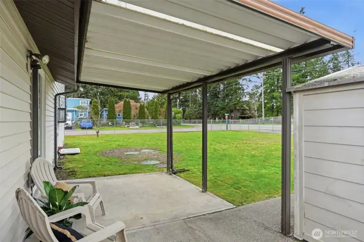 The backyard has a convenient back gate to access the property from the back.