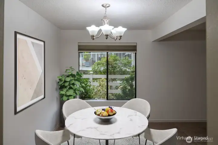 Dining space right off the kitchen (virtual staging)