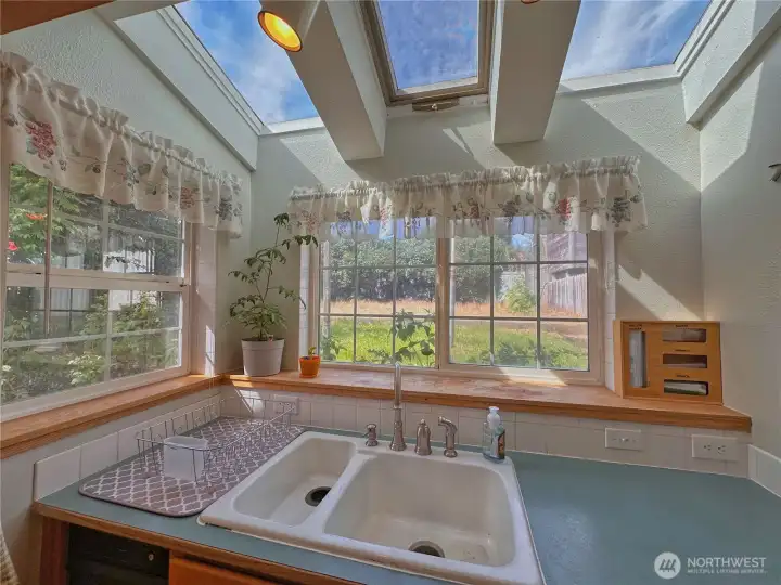 Skylights and double pane vinyl windows provide great natural light