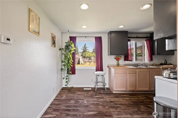 Cozy yet perfect dining area looks into a large, well maintained back yard. Cozy yet perfect dining area looks into a large, well maintained back yard.