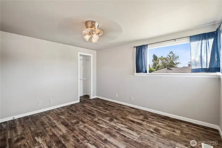 Bedroom 2 with oversized windows and overhead fan to keep you cool! Bedroom 2 with oversized windows and overhead fan to keep you cool!
