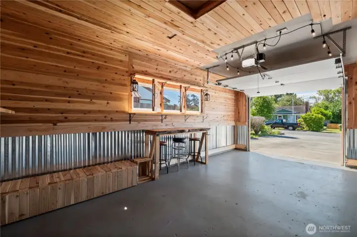 Inviting bar area with live edge top as well as bench seating on the left Inviting bar area with live edge top as well as bench seating on the left