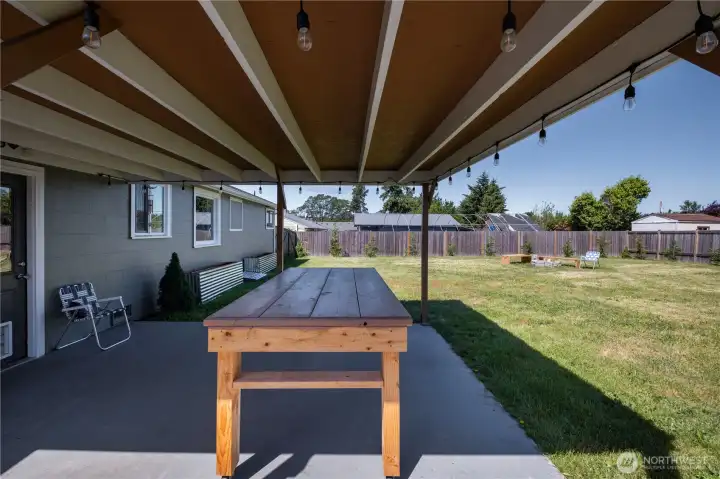 The beautiful project table was designed to roll thru the side gate and into the garage during colder months. It can also be used for bar style seating! The beautiful project table was designed to roll thru the side gate and into the garage during colder months. It can also be used for bar style seating!