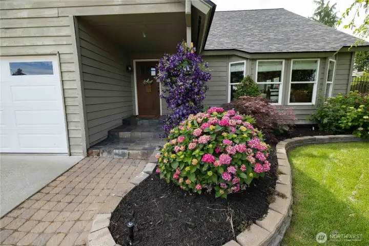 Beautifully landscaped front entry Beautifully landscaped front entry
