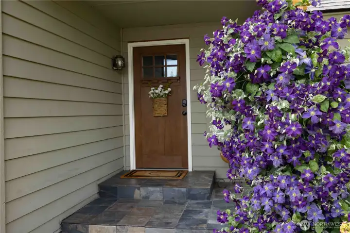 Covered entry with custom tile detail Covered entry with custom tile detail
