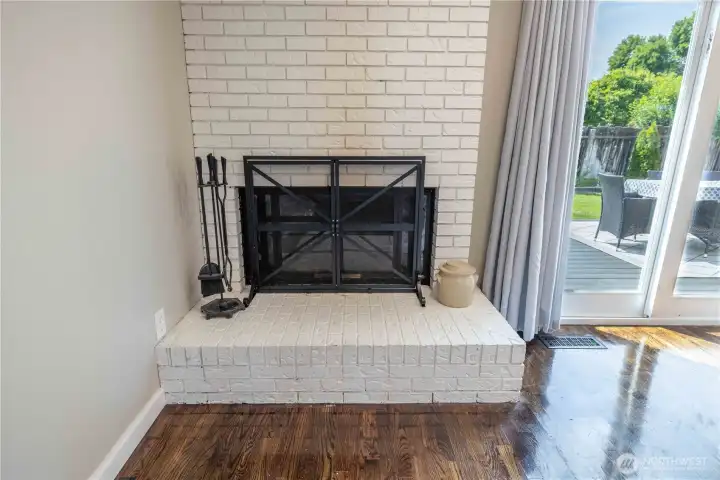 Wood burning fireplace with brick surround Wood burning fireplace with brick surround