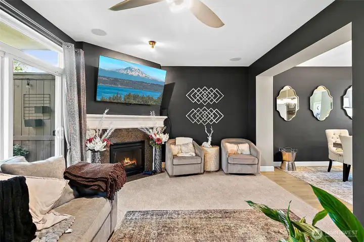 Living room opens to dining and kitchen