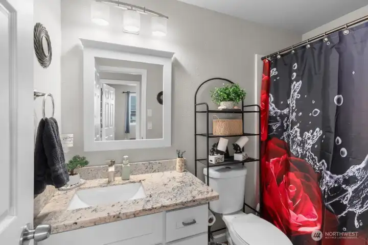 Hallway bathroom with bathtub