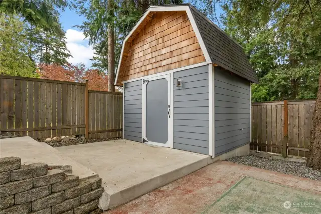 Store your summer cushions, bikes or lawn equipment in this handy shed.  Added bonus that the shed has power!