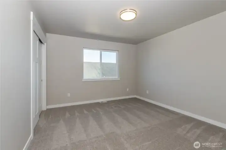 Large guest bedrooms in upper level of like home.