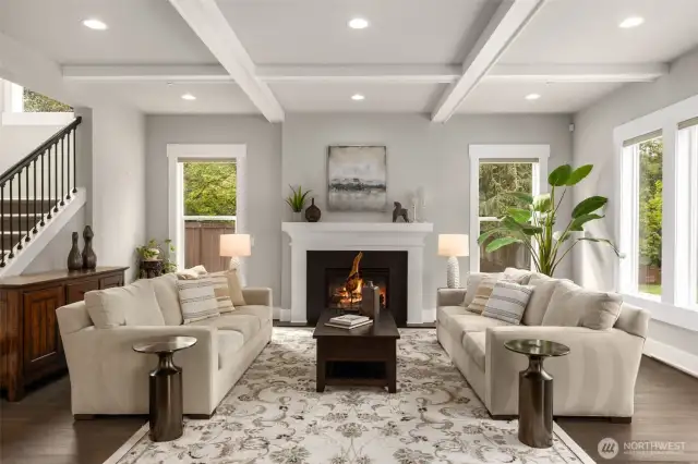 Inviting Great Room with Box Beam Ceilings, Plenty of Windows and great ceiling height