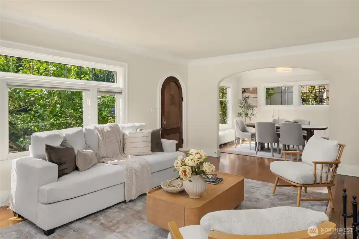 From this angle, you can see the front door and beyond that archway, the dining room.