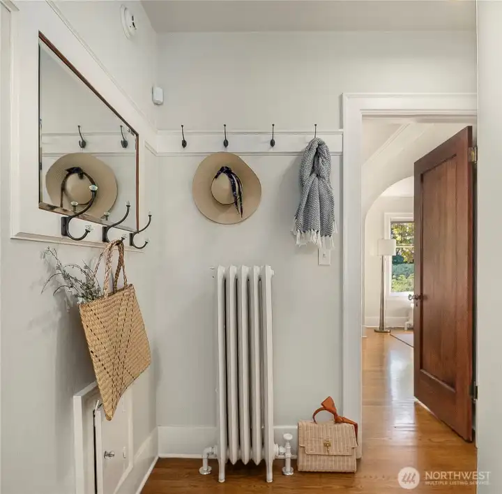 This is the back hallway, the door leads out to the front rooms, and not in the photo is the staircase to the second story.