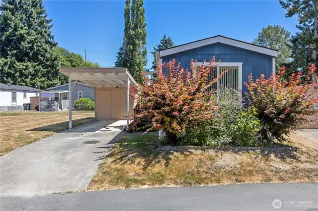 There is off street parking here with the carport and there is a convenient storage shed located behind