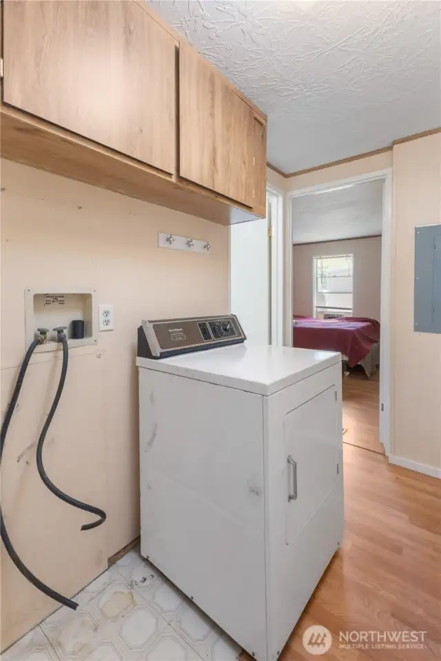 Bring your washer and this convenient utility area will be complete!
