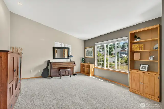 Large living room just off the entry way. Nice carpet & designer paint colors. Large window for natural light!