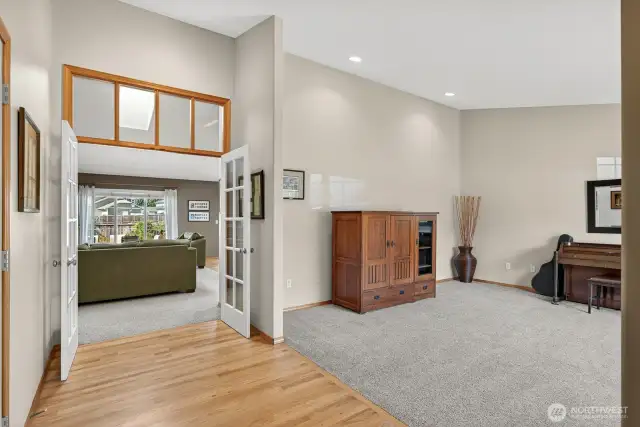 Looking toward the family room through French doors. Added window accents add to the designer touches all throughout.