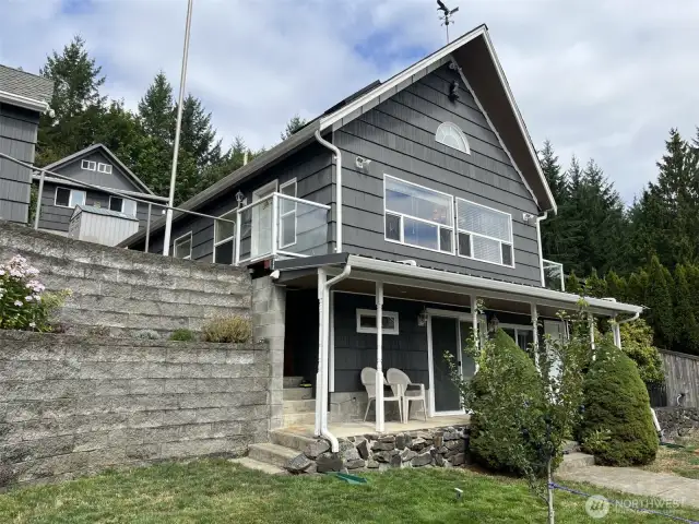 From the dock. 2-story house, shop and garage above.