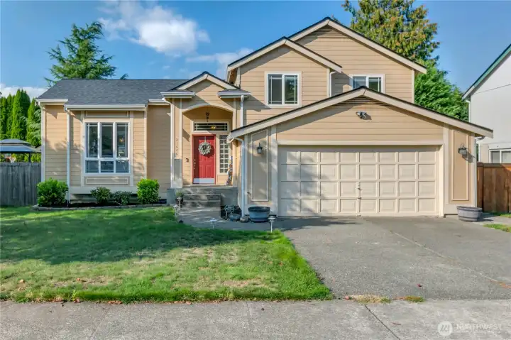 This beautiful tri-level home is located on a cul-de-sac and minutes to the Cedar to Green River Trail. There are double gates to the right that open with plenty of storage for all your toys!