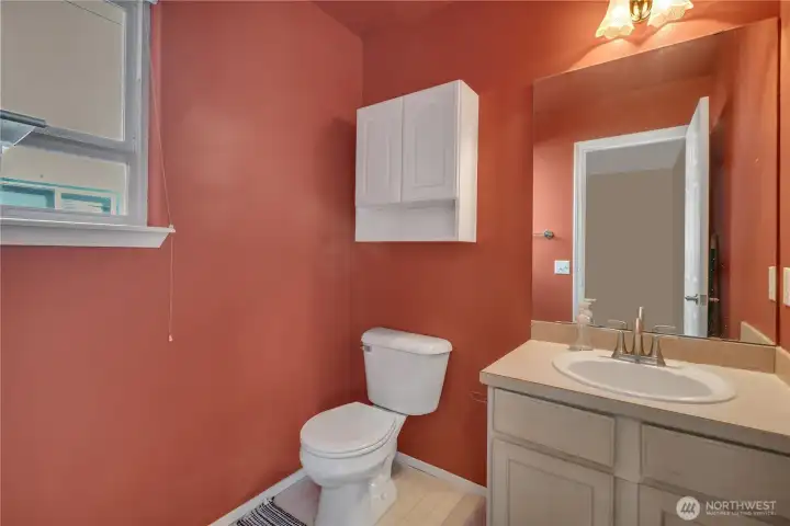 The powder room is located on the lower level.