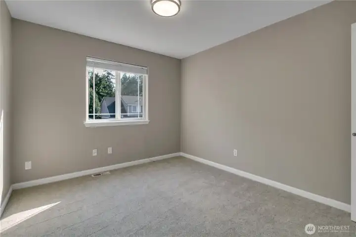 This is one of the two large secondary bedrooms.
