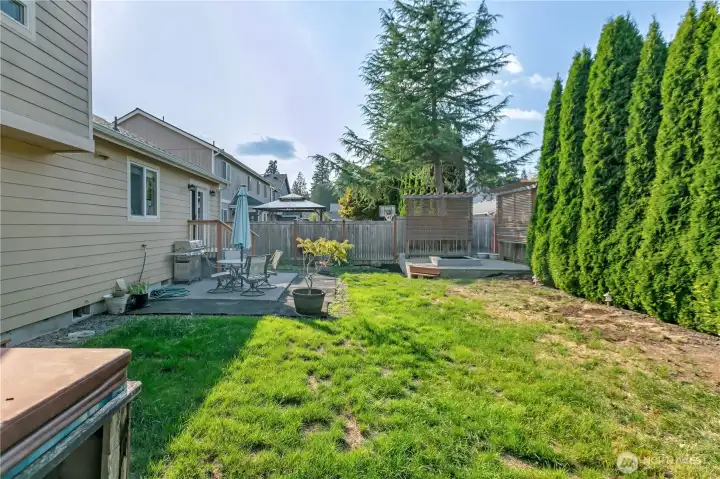 Here's the view from the other side by the hot tub. (It is an older hot tub and it does work. It can stay with the property or the seller can have it removed).