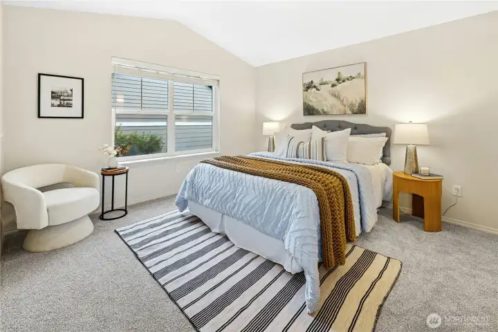 The main floor primary suite is roomy.