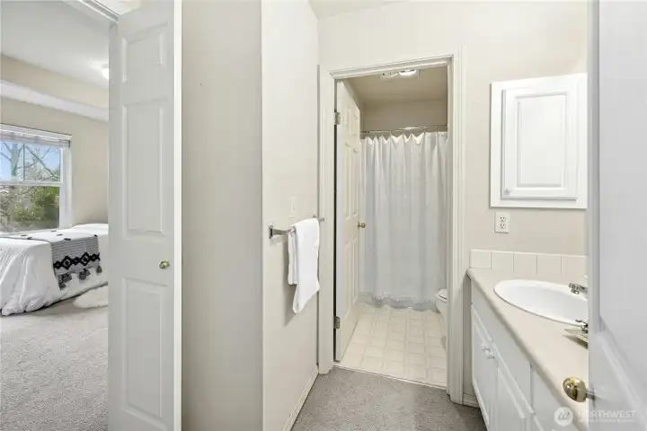 The upstairs bath is shared between the two bedrooms.