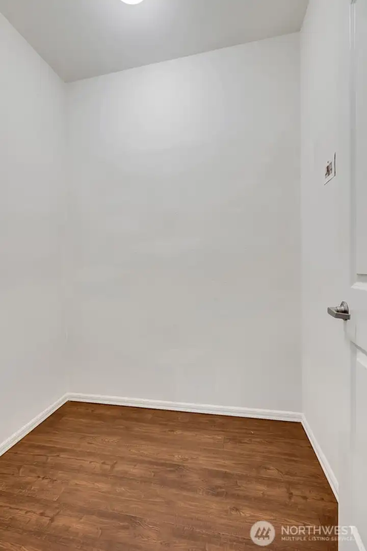 Primary walk-in closet.