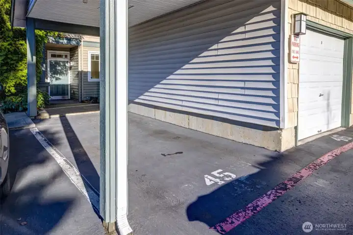 Covered parking spot outside your front door. plus 1 additional pass parking for a second car.