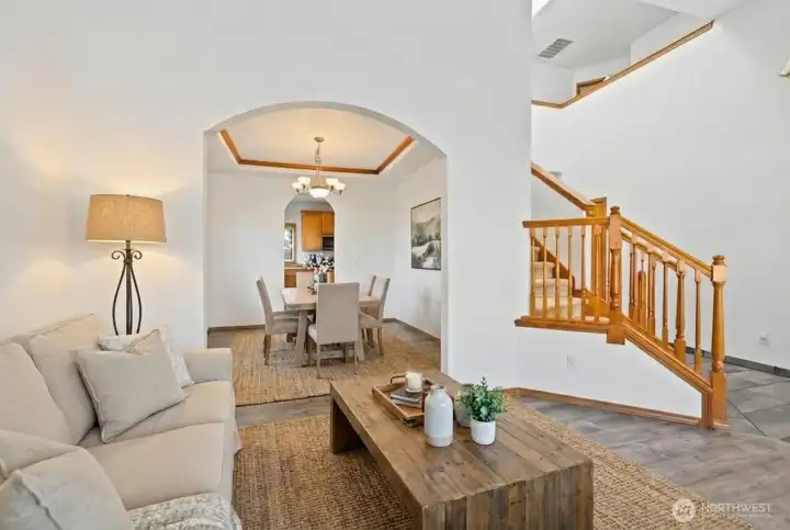 Formal living room just off the dining. (photo virtually staged)