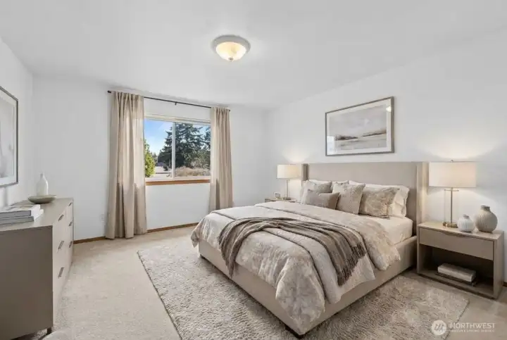 Large primary bedroom. (photo virtually staged)