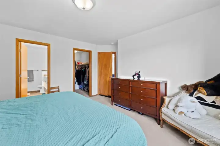 Primary bedrom features walk-in closet and full bathroom.