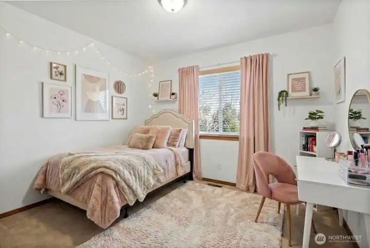 Bedroom two. (photo virtually staged)