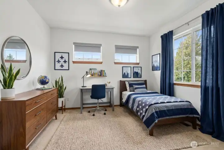 Bedroom three. (photo virtually staged)