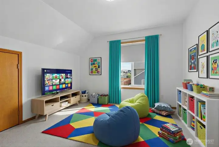 Large bonus room could be used as addtional bedroom, media room or home office. (photo virtually staged)